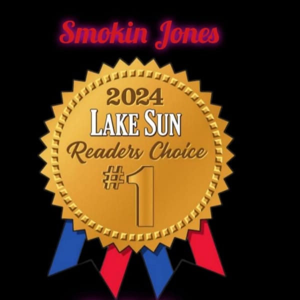 Smokin' Jones 2024 Lake Sun Readers Choice #1 award ribbon on a black background.